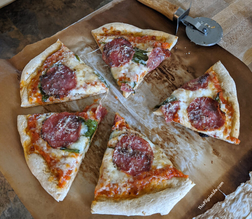 You'll be amazed at how easy it is to make homemade pizza dough! It's so quick and easy, perfect for pizza, calzones, Stromboli, and more! 