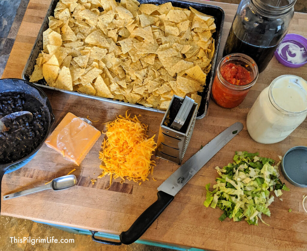 It doesn't get much easier than sheet pan nachos! So delicious, so versatile, and so budget-friendly!