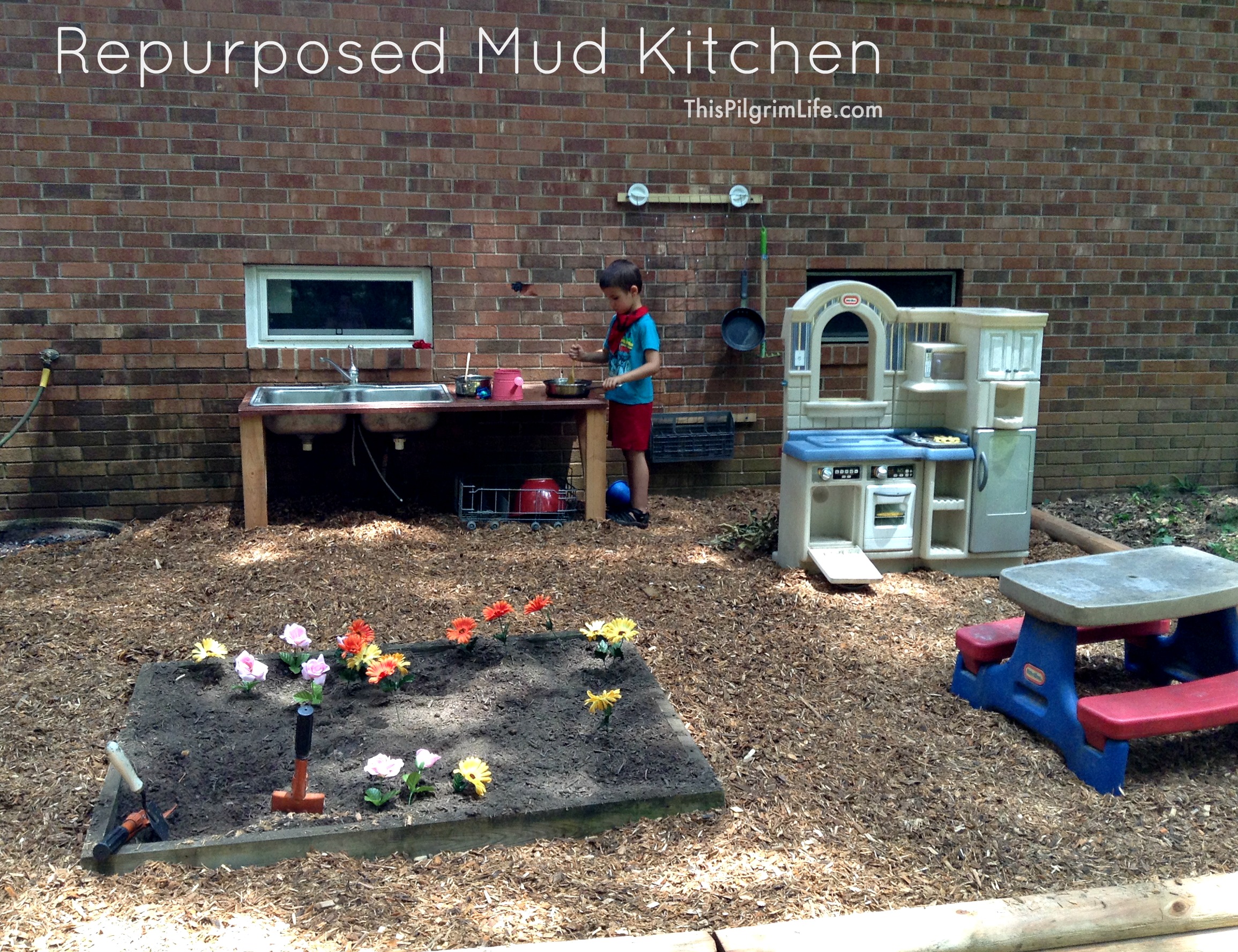 An awesome outdoor mud kitchen made with repurposed items from around the yard and house. Our new favorite backyard hangout!