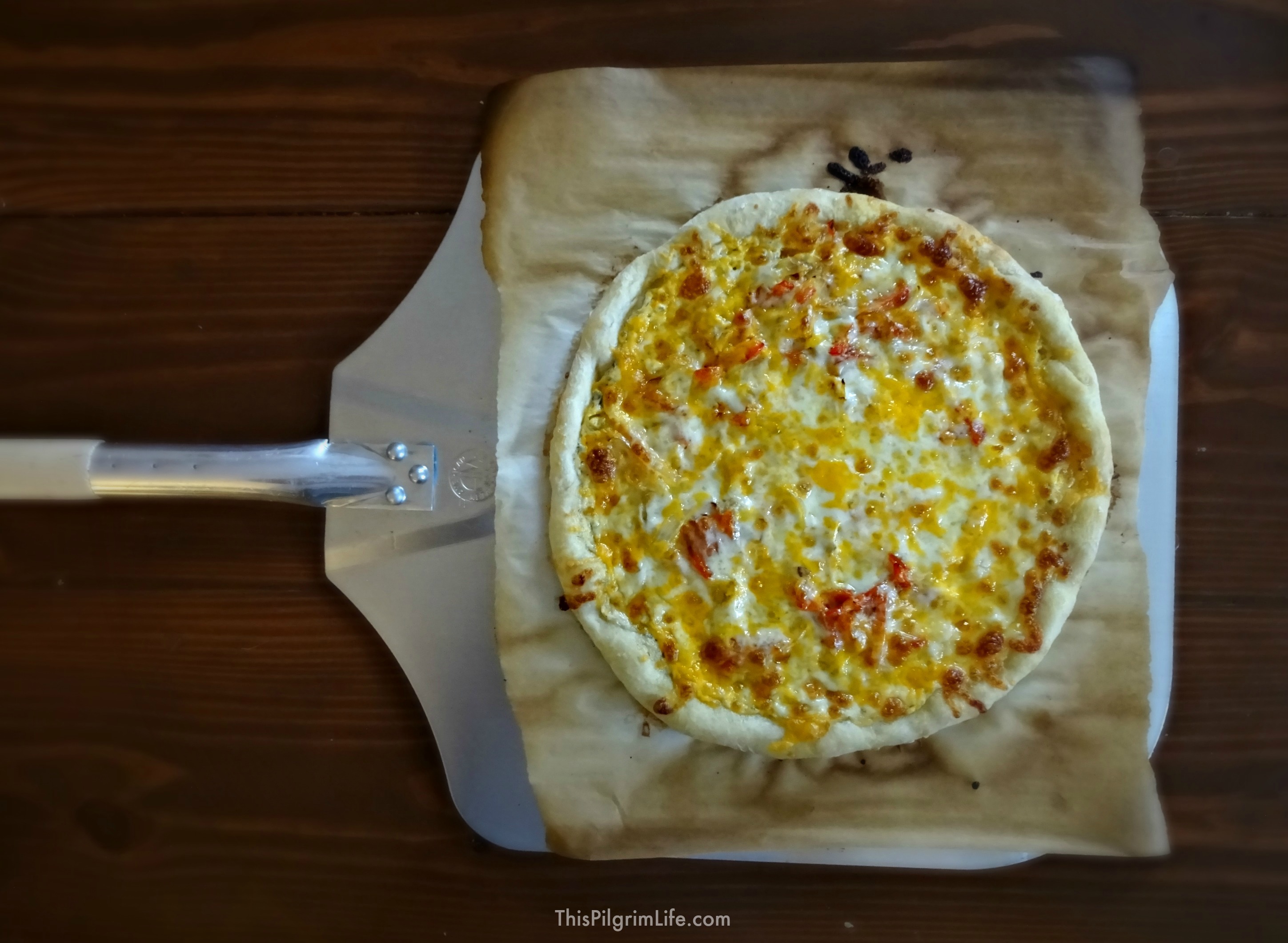{Buffalo Chicken Pizza} Quick and easy homemade pizza made with a spicy ranch sauce and plenty of delicious toppings! 
