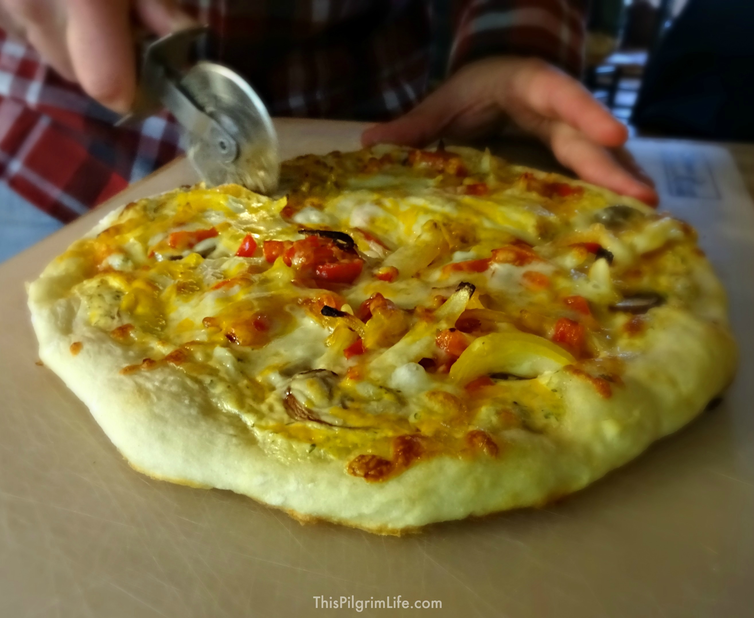 {Buffalo Chicken Pizza} Quick and easy homemade pizza made with a spicy ranch sauce and plenty of delicious toppings! 