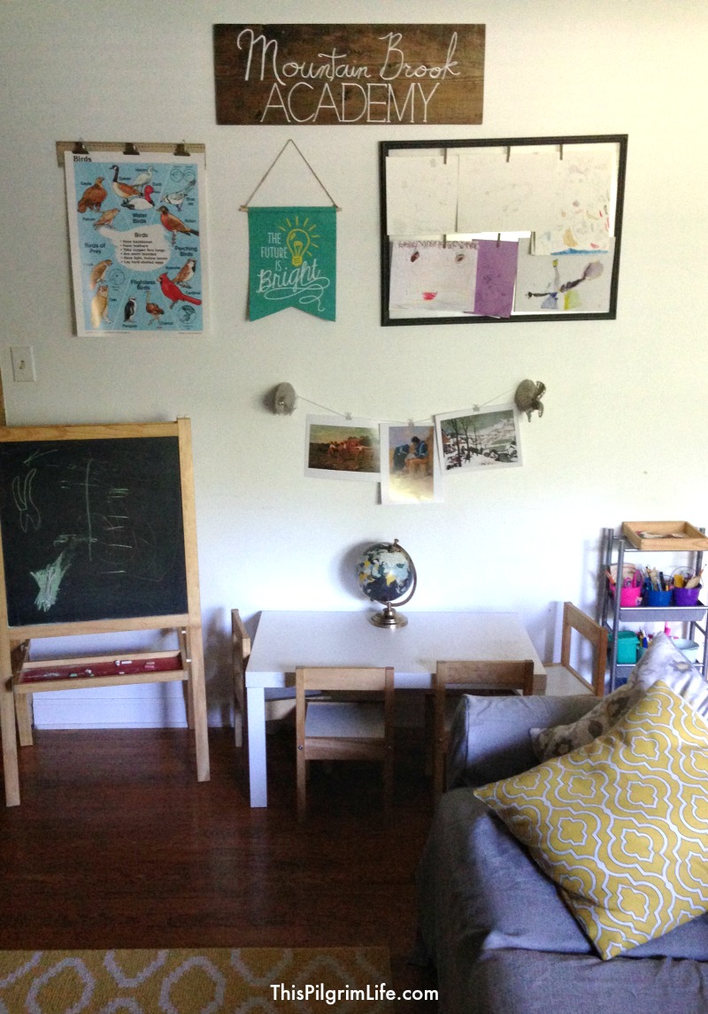 You don't have to have a schoolroom in your house to homeschool. And homeschooling doesn't mean your house has to look like a classroom. Here's how we set up an uncluttered but functional school area in our home's common room. 