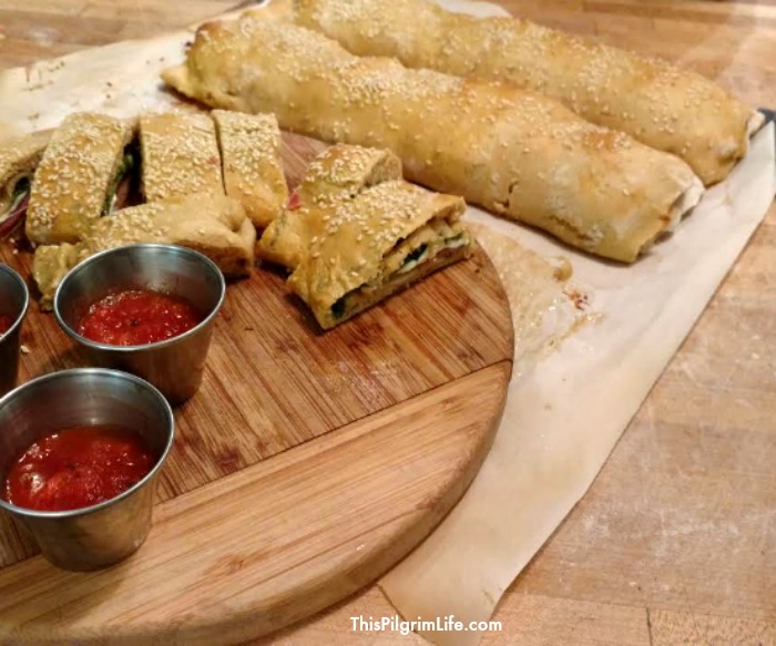 Fold up some Italian meat and cheese in a simple pizza dough and you have an amazing meal of homemade stromboli! Just don't forget the marinara sauce for dipping! 
