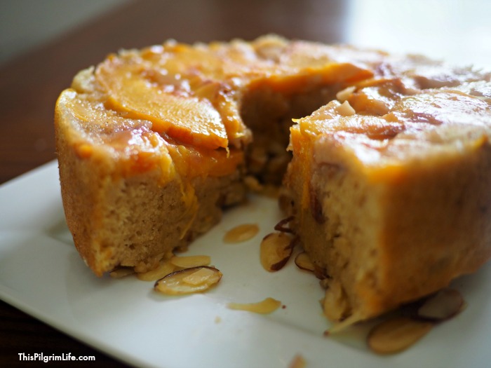 This upside down peach cake is AMAZING! Naturally sweetened, no oils or butter, and made in the pressure cooker to give it extra richness and moistness. 