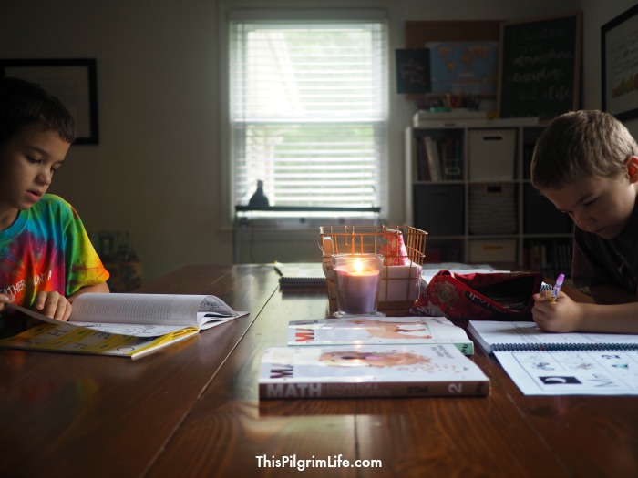 It's possible to create an organized homeschool space in a common room without it looking like a classroom! Here is how this mom makes her dining room into a functional homeschool space while keeping the room relaxing and inviting! 