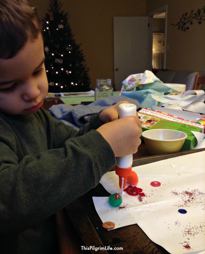 Making sticky Christmas trees is a fun holiday craft for your preschooler! Use supplies you have on hand and let your child have fun decorating the tree! 