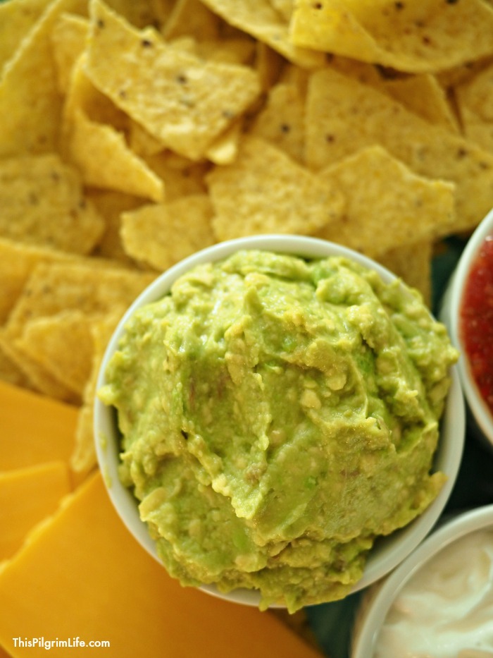 This easy guacamole can be made in ONE MINUTE! We're talking change-your-life simple and delicious!
