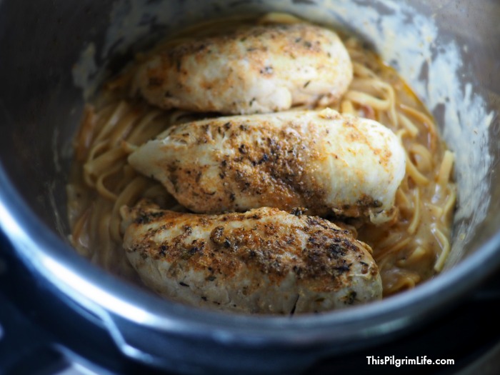 Juicy blackened chicken breasts, silky fettuccine noodles, and a perfect creamy Alfredo sauce-- all made in the Instant Pot! This lighter Instant Pot fettuccine Alfredo takes a favorite Italian dish and makes it easy and healthy enough for a weeknight meal!
