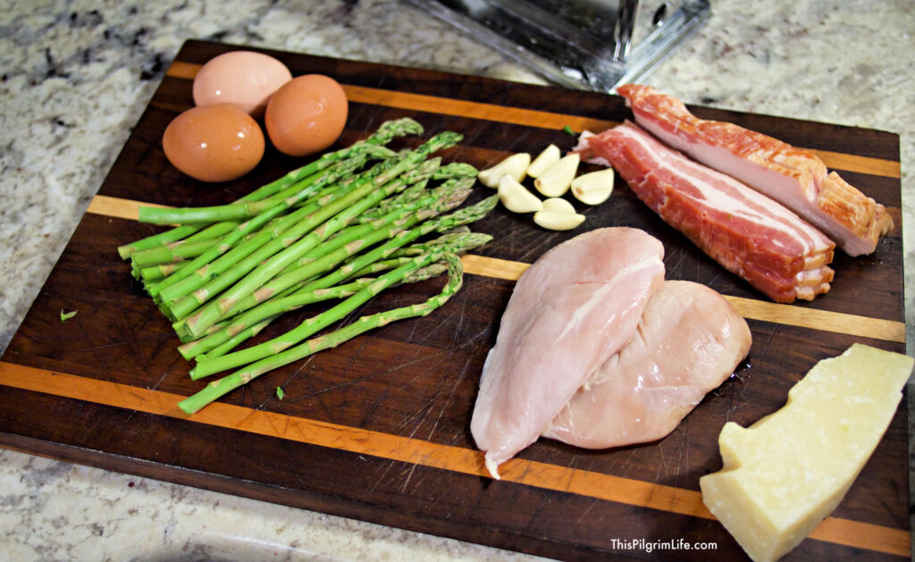 Silky noodles, salty bacon, tender chicken, and crispy asparagus complement each other perfectly in this easy skillet chicken carbonara! You won't believe how simple the recipe is and how quickly it comes together! 