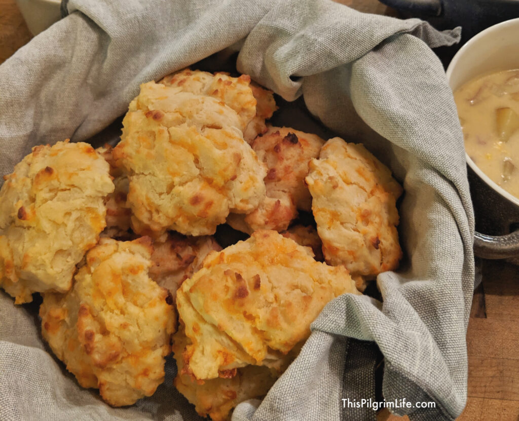 Cheddar garlic drop biscuits are so simple to make from scratch and taste just like the Red Lobster biscuits! I love serving these biscuits with our meal when we want bread but do not have time for one-hour French bread or focaccia. 