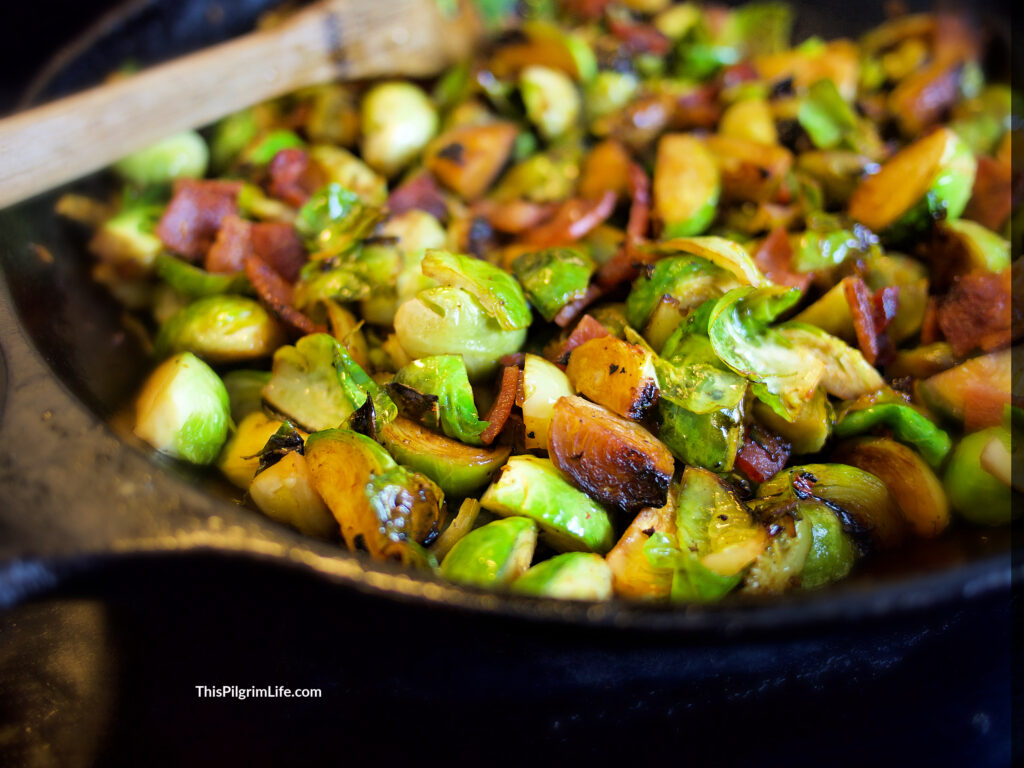 These maple Brussel sprouts and bacon are such a simple but delicious side dish! The Brussels get tender and caramelized in the pan, and the addition of the bacon balances out the slightly sweet maple syrup with the perfect level of saltiness. 